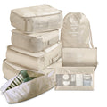 Beige 8 piece packing cube set: 4 zip cubes, drawstring bag, shoe bag, flat pouch and mesh toiletry bag