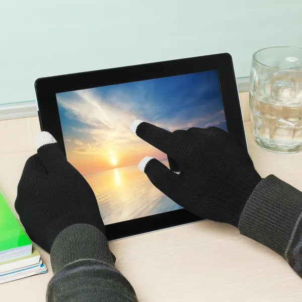 Using a tablet while wearing the Black touchscreen knit gloves