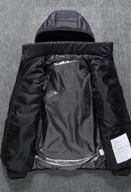 Inside lining and inner pocket of the black USB heated puffer